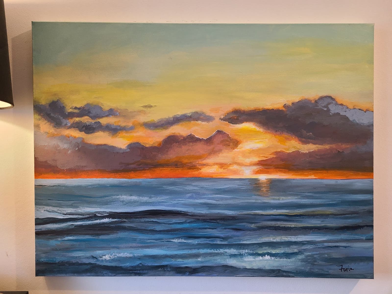 Acrylic seascape of a sunset over open water, with violet and amber cloud banks above a band of orange light on the horizon.