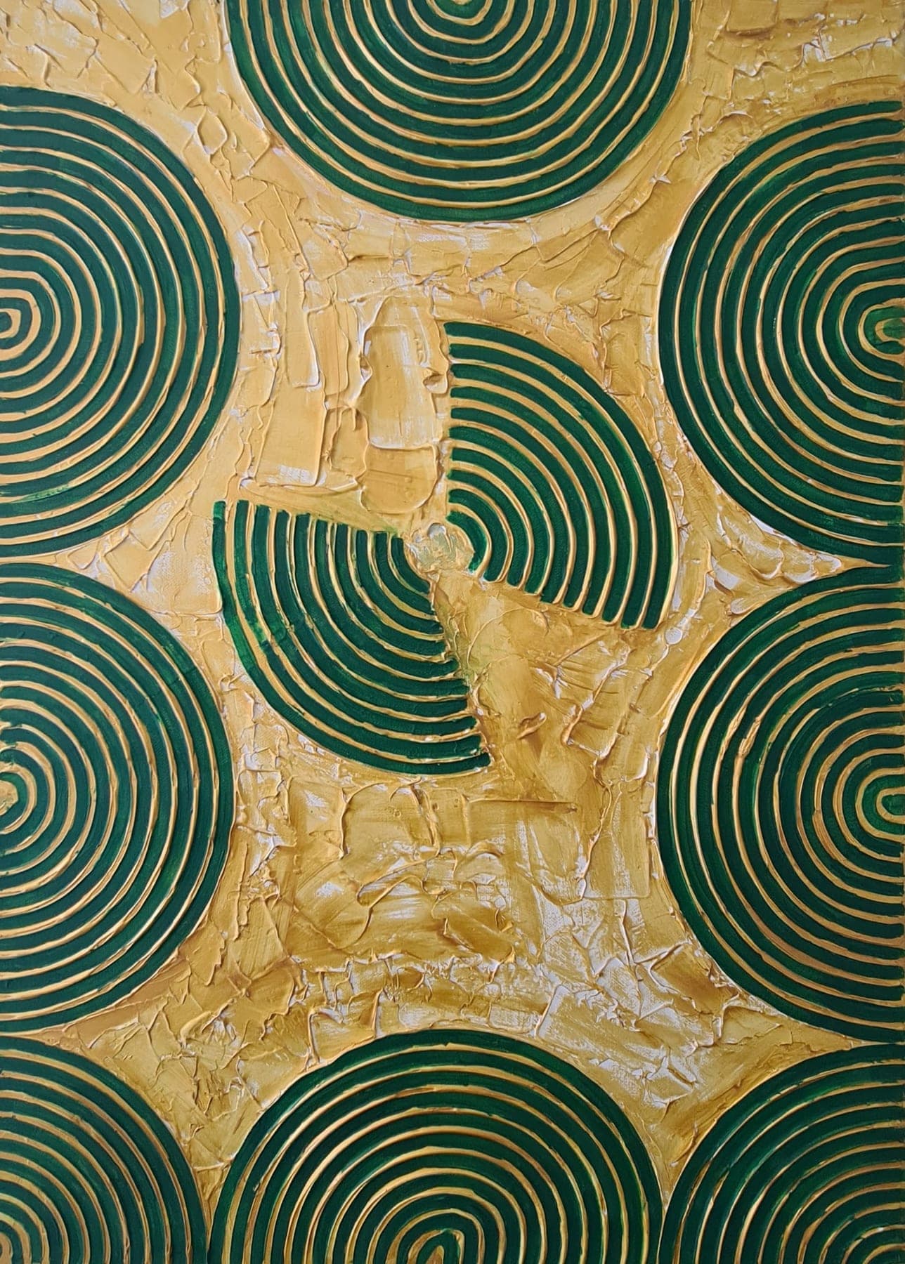 Concentric rings of deep green combed into thick paint on a gold ground, the circles overlapping and running off all four edges.